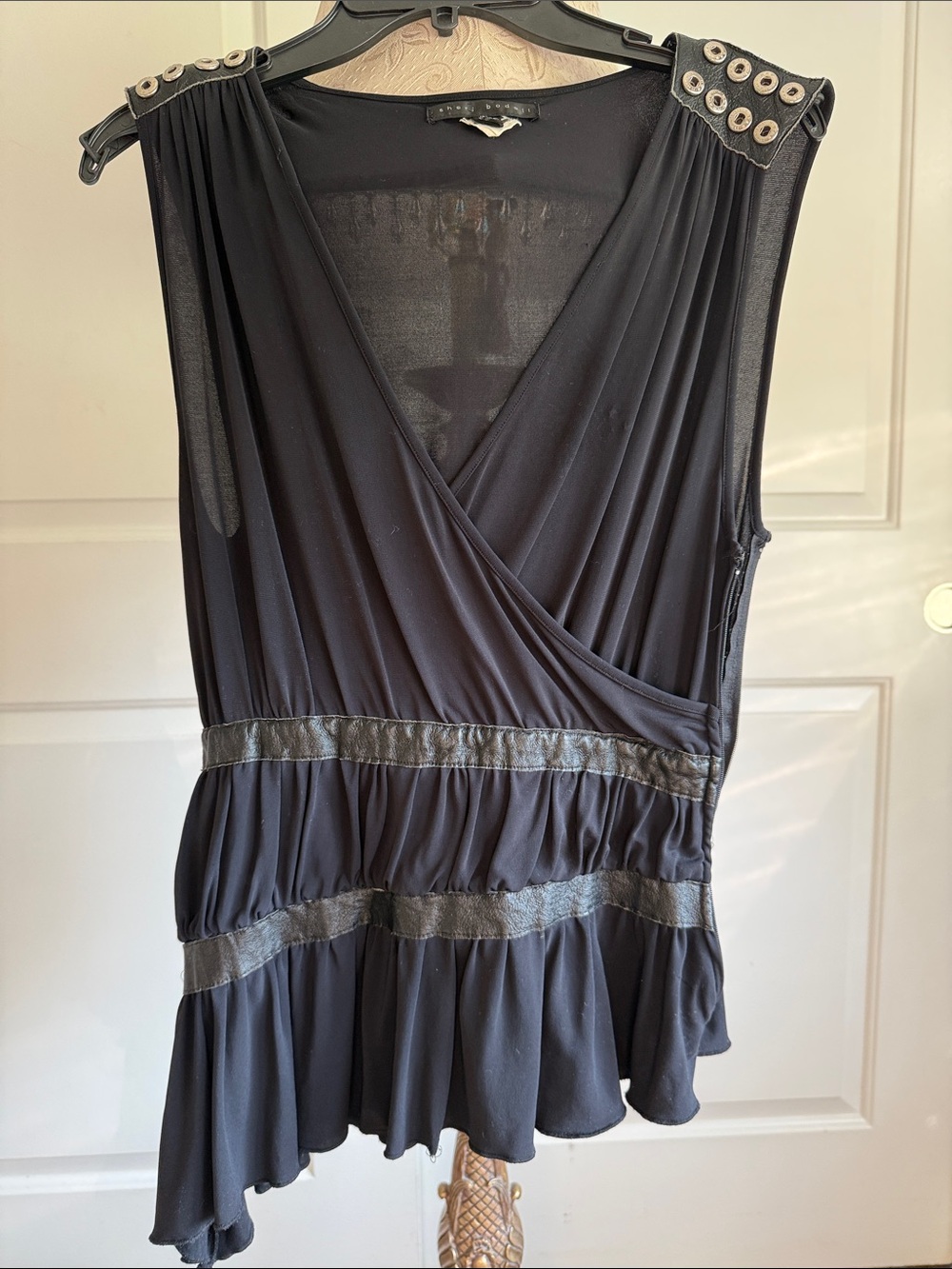 Sheri Bodell 🖤 Sleeveless Black Wrap Peplum Top with Grommet Shoulder Detail